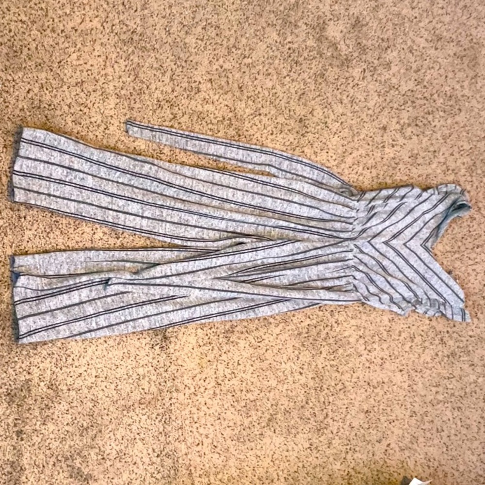 The color is a grey and the lines and design is black very soft and comfortable
